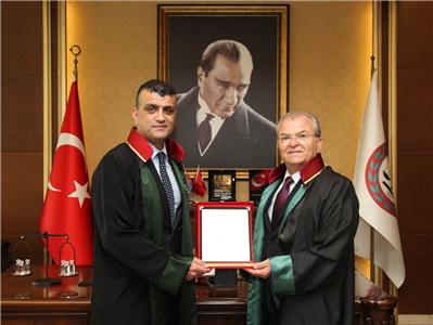 AV. ADNAN GÜNDOĞDU’YA MESLEKTE 40. YIL PLAKETİ TAKDİM EDİLDİ